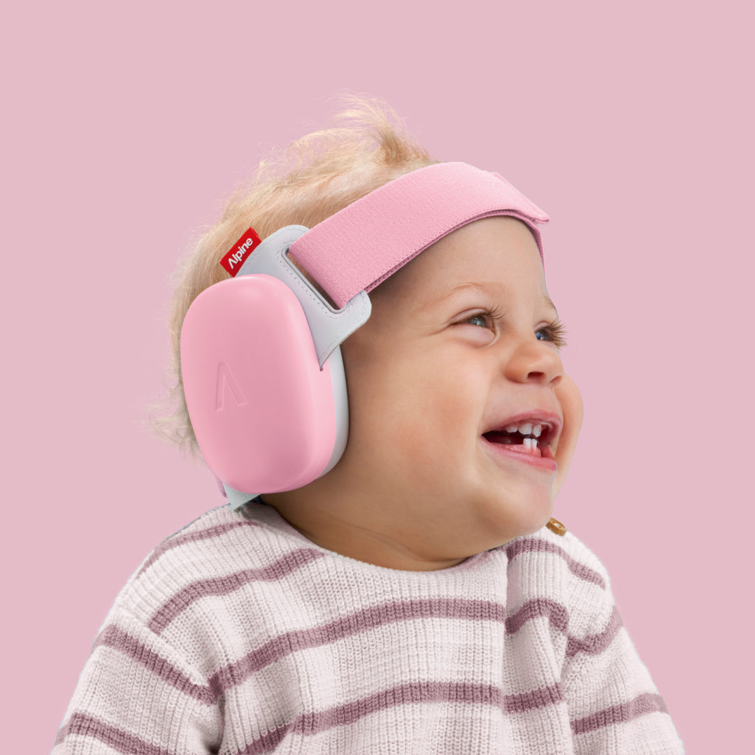 Baby wearing muffy baby in rose-pink