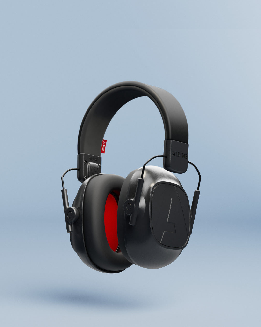 Alpine Defender earmuffs with adjustable headband and red ear cushions, 3D render